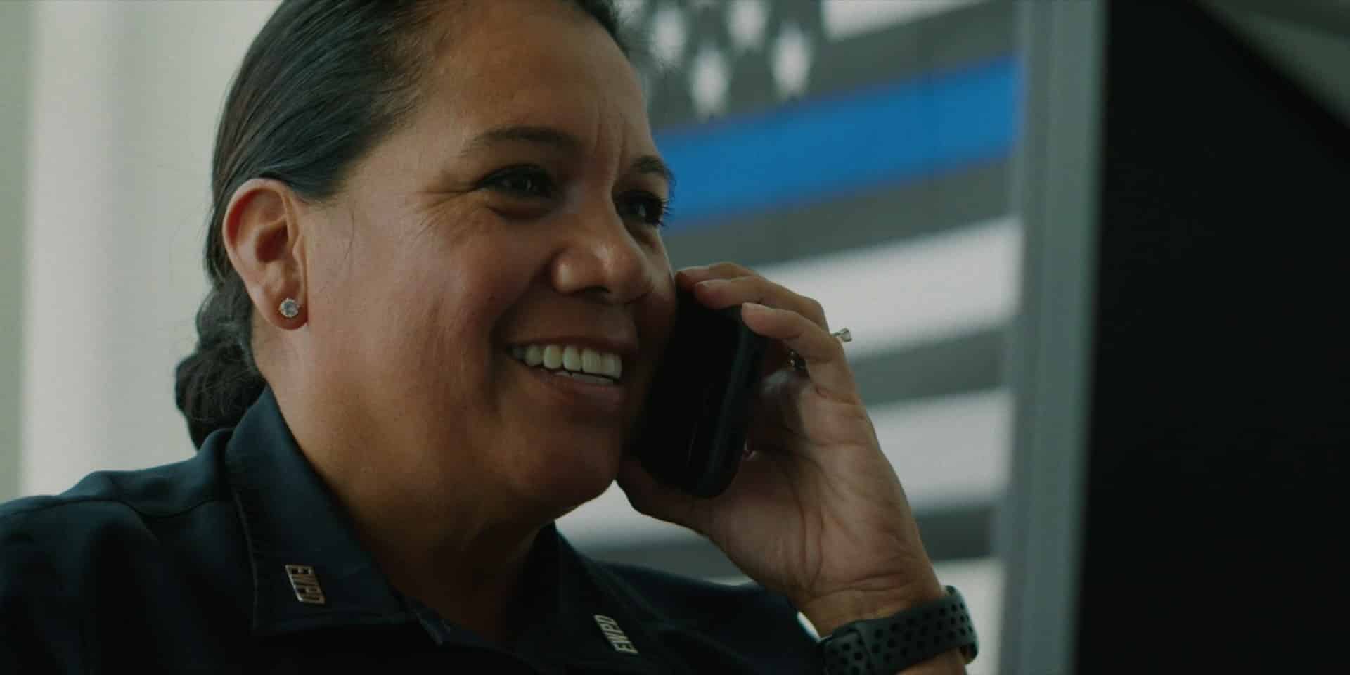 police officer talking on phone